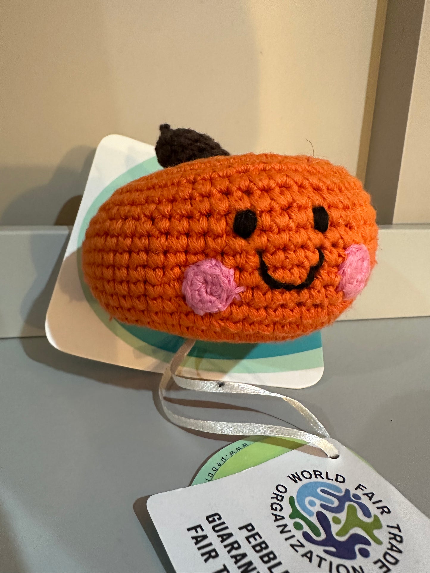 Pebble Fairtrade Pumpkin Vegetable Baby Rattle