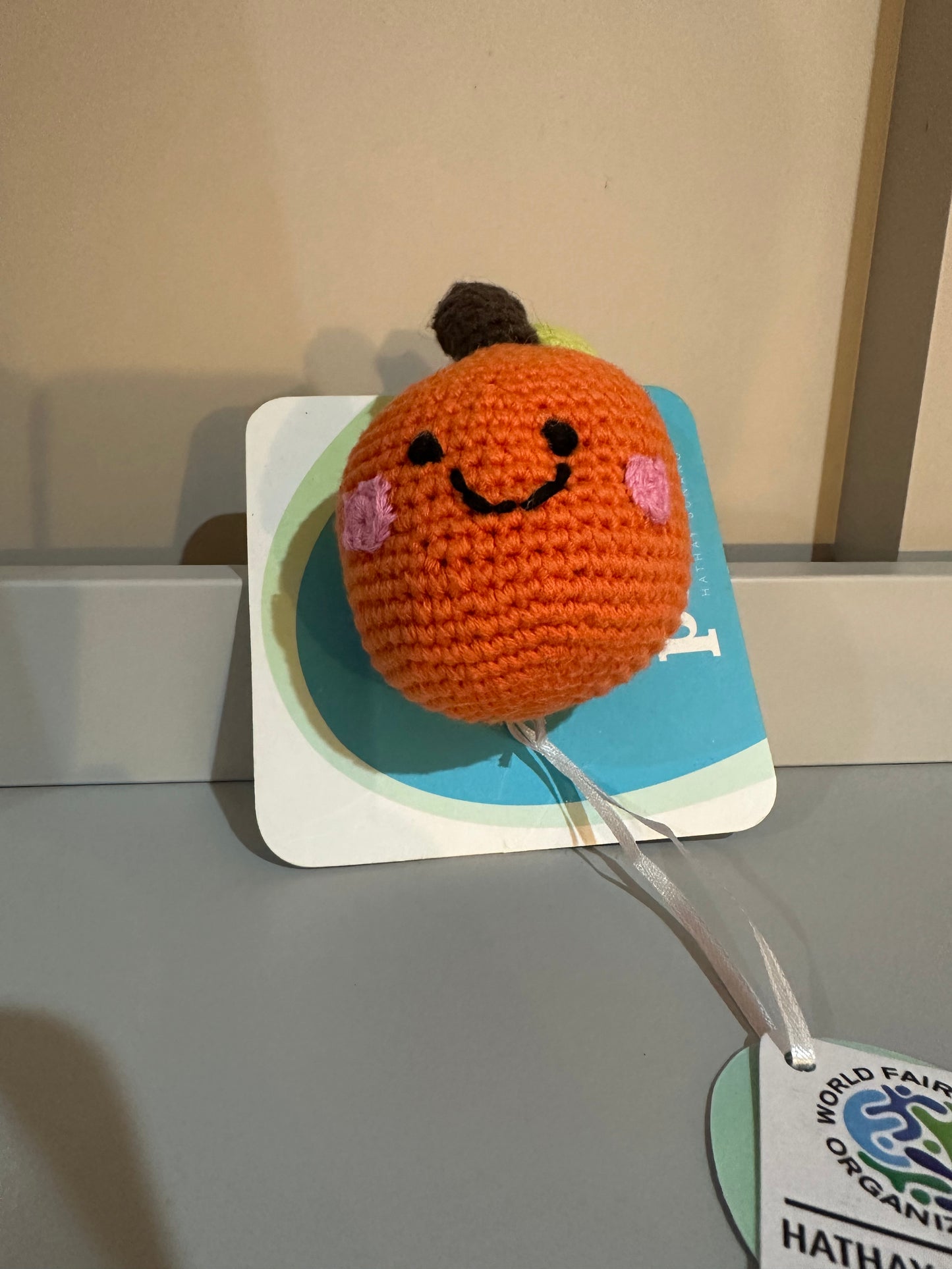Pebble Fairtrade Knitted Orange Fruit  Baby Rattle
